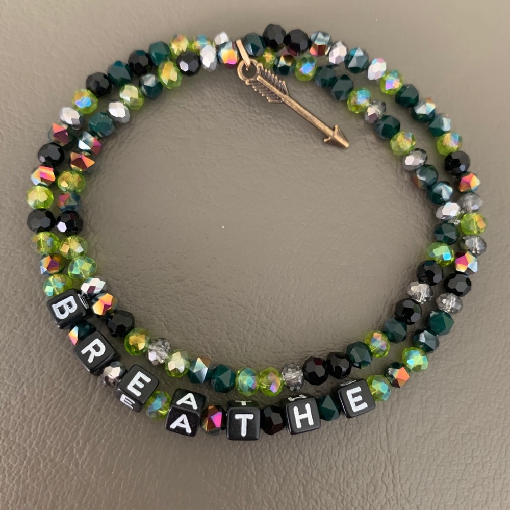 Green, black & silver bead bracelet w/ charm